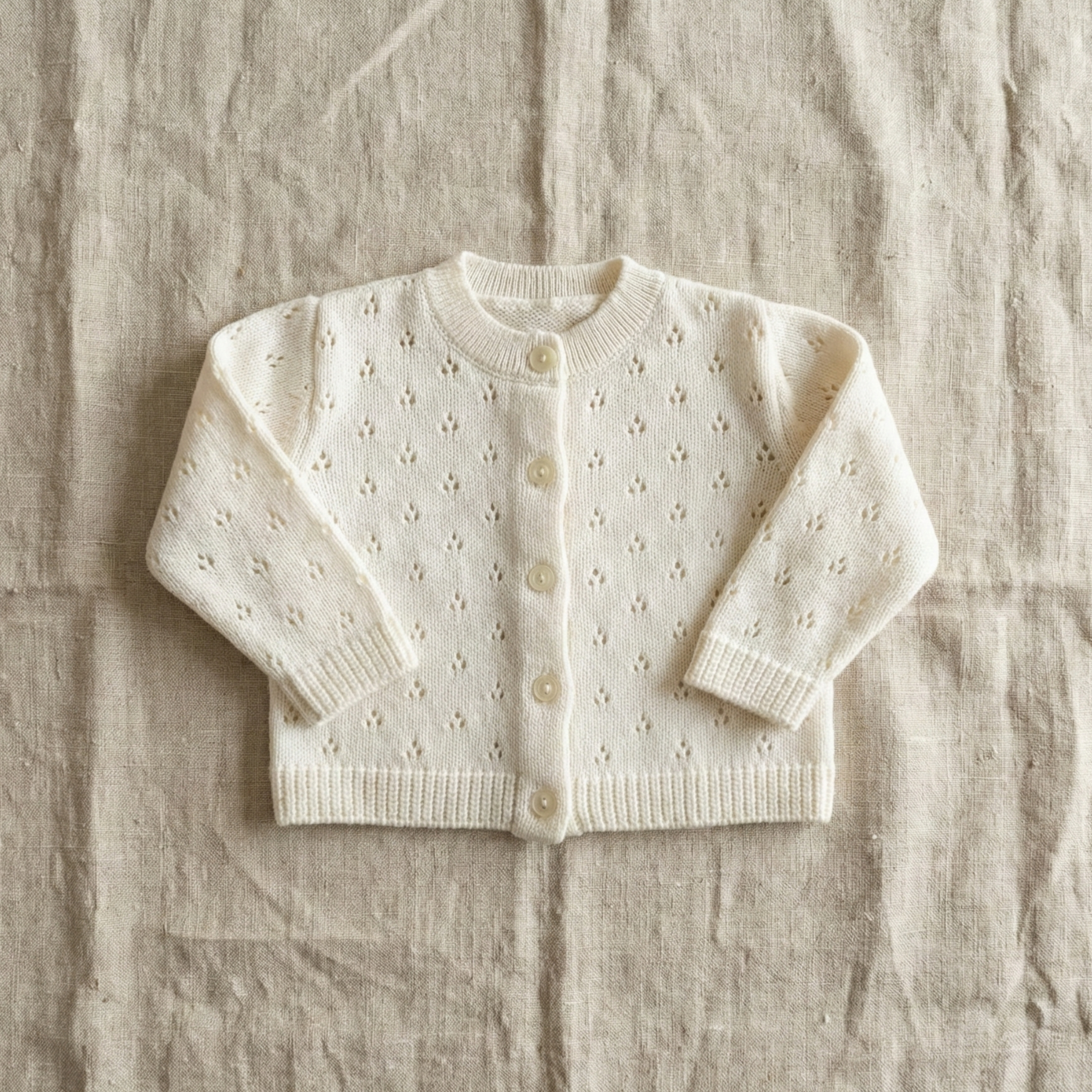 Ribstrikket hulmønster cardigan i bomuld